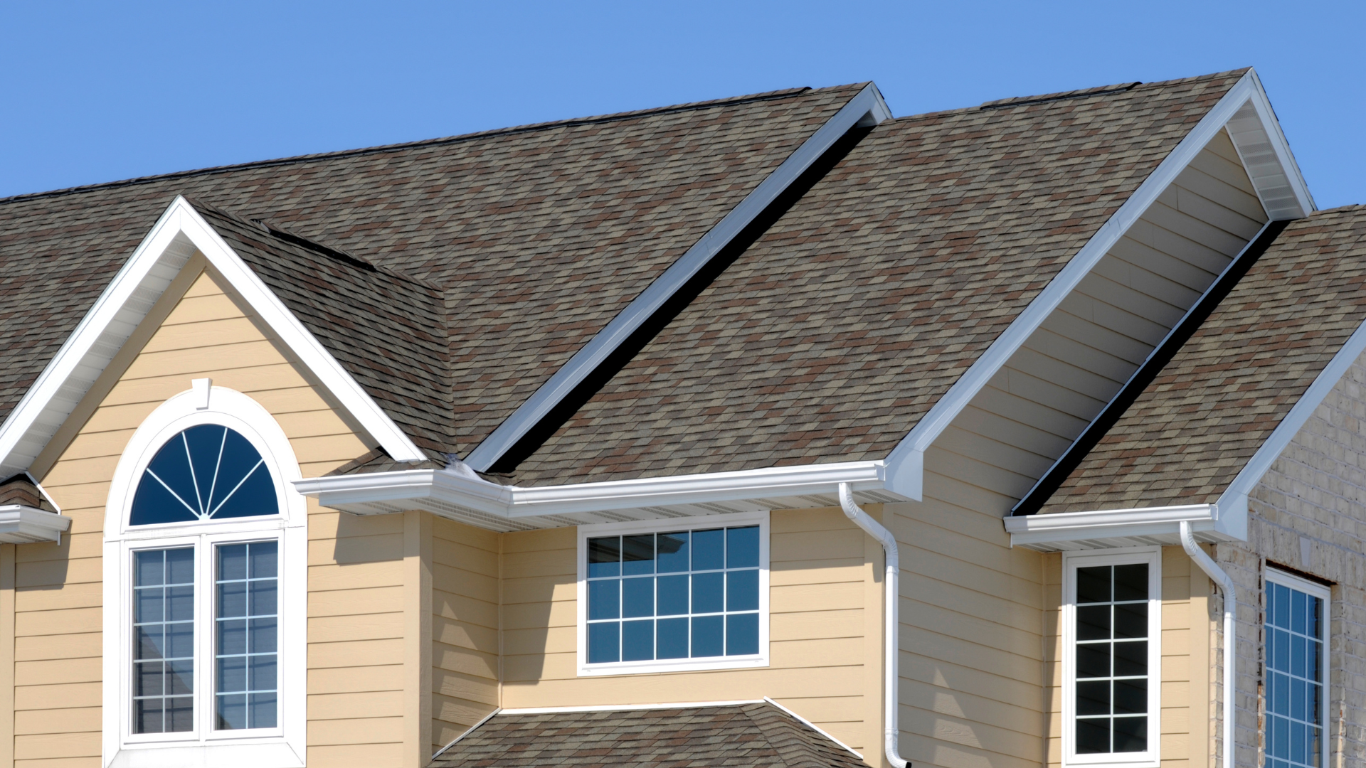 Completed residential roof installed by Higher Ground Roofing